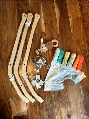 Love every play gym (wooden legs) and strands